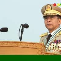 Myanmar armed forces chief Senior Gen. Min Aung Hlaing attends an annual parade put on by the military to mark Armed Forced Day in the capital, Naypyidaw, in a screenshot taken from Myawaddy TV on Saturday.  | MYAWADDY TV / VIA AFP-JIJI