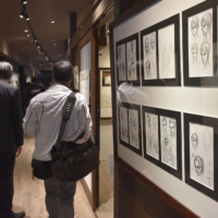 A museum on the \"Attack on Titan\" manga series that opened Saturday features early works by author Hajime Isayama. | KYODO 