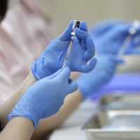 The health ministry has released in 12 languages basic information on the COVID-19 vaccination, including who can get inoculated, the possible side effects and how a person can get the shot. | BLOOMBERG