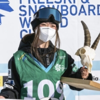 Reira Iwabuchi celebrates on the podium after winning a World Cup event in Silvaplana, Switzerland, on Sunday. | INTERNATIONAL SKI FEDERATION / VIA KYODO