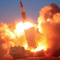 A suspected missile is fired in a photo released by North Korea\'s state news agency in March 2020.  | KCNA / VIA REUTERS  