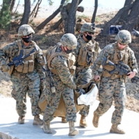 U.S. Army soldiers and South Korean Marines take part in a joint military exercise in Pohang, South Korea, on Thursday.  | YONHAP / VIA REUTERS    