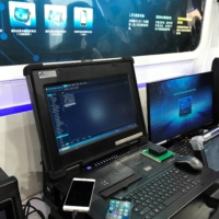 A scanner made by Hisign Technology that can glean data out of mobile phone apps such as Facebook and Twitter and analyze user social network connections is displayed at an exhibition in Beijing in May 2018.  | REUTERS