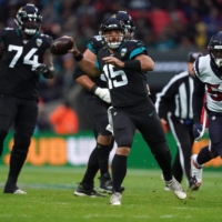 Jaguars quarterback Gardner Minshew (15) is pressured by Texans linebacker Whitney Mercilus during their game at  Wembley Stadium in London on Nov. 3, 2019. | USA TODAY / VIA REUTERS