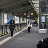 A nearly empty train platform in Berlin on March 24.  | LENA MUCHA / THE NEW YORK TIMES