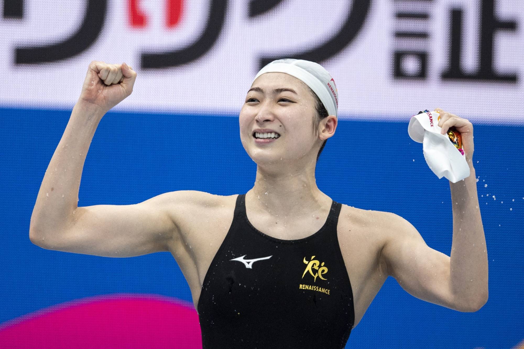Rikako Ikee reacts after winning the 100-meter butterfly final during the national championships on Sunday. | AFP-JIJI