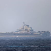 The Chinese aircraft carrier Liaoning sails through the Miyako Strait near Okinawa on its way to the Pacific in this photo released Sunday.  | JOINT STAFF OFFICE OF THE DEFENSE MINISTRY / VIA REUTERS 