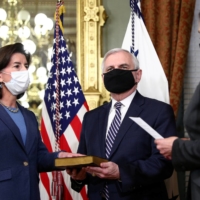 U.S. Vice President Kamala Harris holds a ceremonial swearing-in for Secretary of Commerce Gina Raimondo at the White House on March 3. | REUTERS