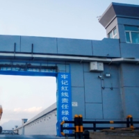 A gate of what is officially known as a \"vocational skills education center\" is photographed in Dabancheng, in China\'s far-west Xinjiang region, in September 2018. The centers have been described by critics as internment camps used to indoctrinate Uyghurs and other Muslims. | REUTERS