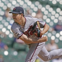 Twins starter Kenta Maeda pitches against the Tigers in Detroit on Wednesday. | AP / VIA KYODO
