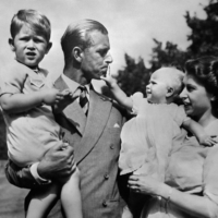 The Royal British couple — Queen Elizabeth II, and her husband, Prince Philip, Duke of Edinburgh — with their two children, Charles, Prince of Wales, and Princess Anne, in 1952. | VIA AFP-JIJI