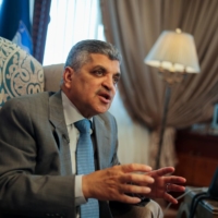 Osama Rabie, chairman of the Suez Canal Authority, speaks during an interview at his office in the city of Ismailia, Egypt, on Tuesday.  | REUTERS