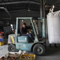 Chuang Cheng-deng at his rice farm in Hsinchu | AN RONG XU / THE NEW YORK TIMES