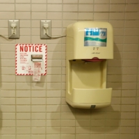 Based on multiple experiments and simulations, Keidanren found the risk of infection from water drops and microdroplets in the air after handwashing is \"extremely low\" even when hand dryers are used. | REUTERS