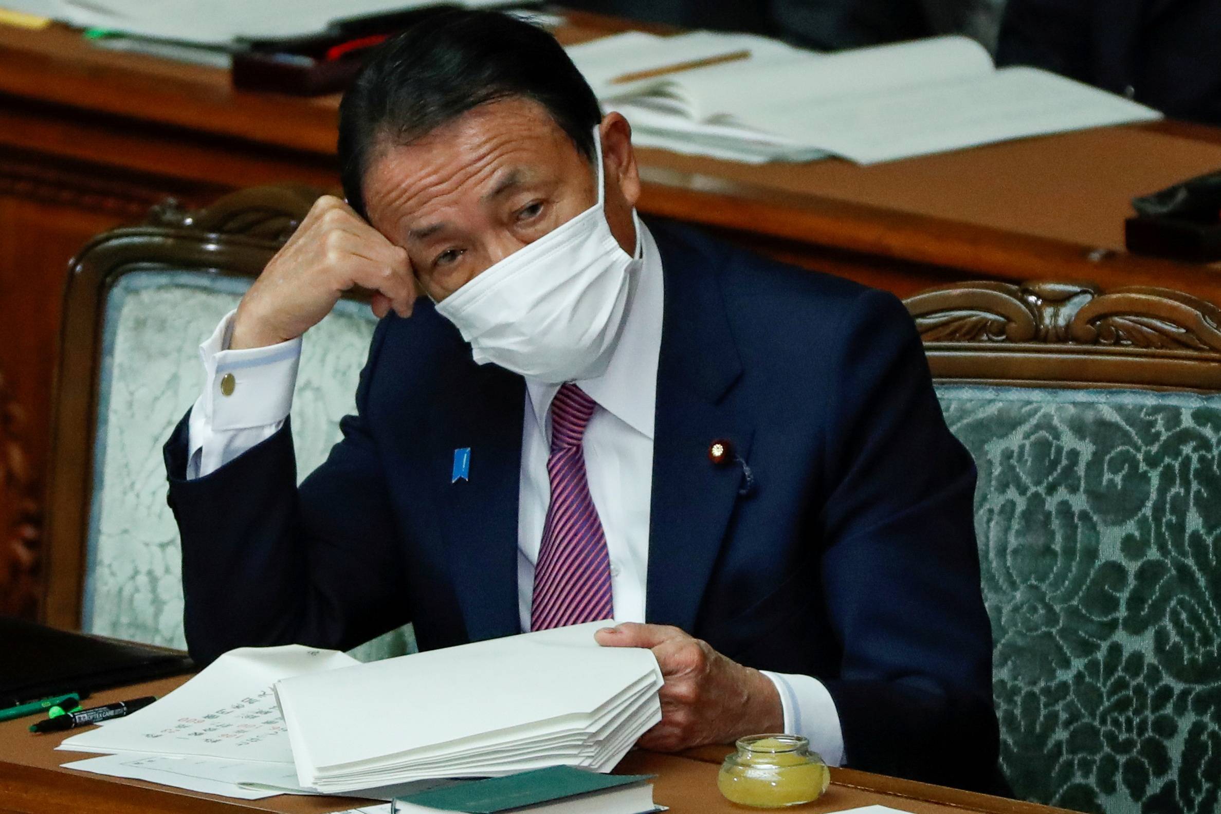 Deputy Prime Minister Taro Aso was challenged to drink treated water from the Fukushima No. 1 nuclear plant after claiming it would be safe to do so. | REUTERS