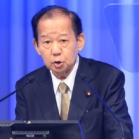 Toshihiro Nikai\'s remarks over a possibly Olympic cancellation came as doubt continues to shroud the Tokyo Games.  | BLOOMBERG