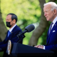 U.S. President Joe Biden speaks alongside Prime Minister Yoshihide Suga during a joint news conference at the White House on Friday.  | REUTERS 