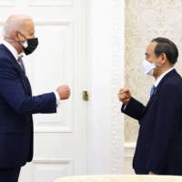 Prime Minister Yoshihide Suga and U.S. President Joe Biden meet at the White House in Washington on Friday. | PRIME MINISTER\'S OFFICE / VIA KYODO