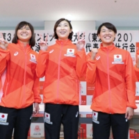Rikako Ikee (center) and fellow Nihon University swimmers chosen for Japan\'s Olympic team pose during a sendoff ceremony on Saturday in Tokyo\'s Setagaya Ward. | HANDOUT / VIA KYODO