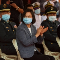 Taiwan President Tsai Ing-wen applauds during the launch ceremony for the Taiwanese Navy\'s domestically built amphibious transport dock Yushan in Kaohsiung on April 13. | REUTERS