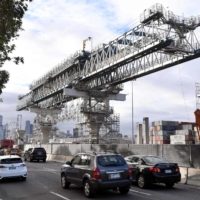 Motorists commute past a road infrastructure project in Melbourne on Thursday. | AFP-JIJI