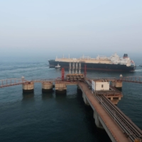A liquified natural gas tanker leaves a dock after discharge at PetroChina\'s receiving terminal in Dalian, China\'s Liaoning province, in July 2018. | REUTERS