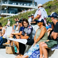 Connor O\'Leary sits with his parents during the first round of the Rip Curl Newcastle Cup in Newcastle, Australia, on April 1. | WSL / MATT DUNBAR