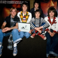 Roll with it: The Bay City Rollers were made up of (from left) Derek Longmuir, Alan Longmuir, Les McKeown (in back), Ian Mitchell and Stewart Wood. Here the group takes part in the launch of an anti-smoking campaign in a file photo from 1975. Lead singer McKeown passed away on April 20. | REUTERS