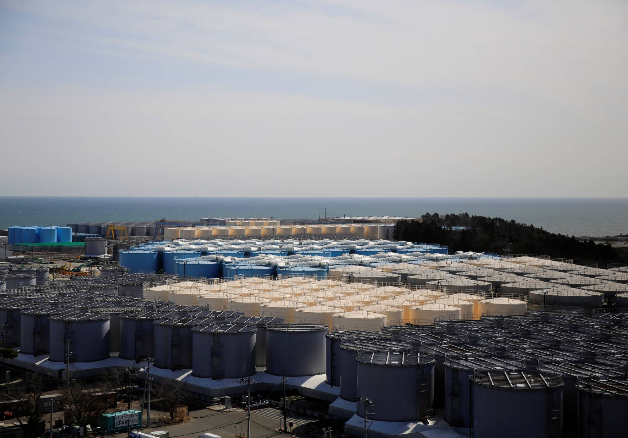 Storage tanks for treated water at the Fukushima No. 1 nuclear power plant in the town of Okuma, Fukushima Prefecture | REUTERS