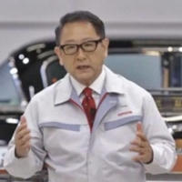 Akio Toyoda, president of Toyota Motor Corp., speaks in an online ceremony for new employees on April 1. Toyota will increase its the proportion of software engineers among its hiring intake next spring. | KYODO