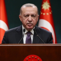 Turkish President Recep Tayyip Erdogan speaks to media following a Cabinet meeting in Ankara on Monday. | PRESIDENTIAL PRESS OFFICE / VIA REUTERS 