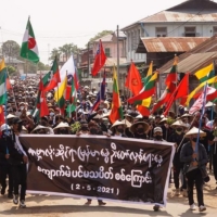 People demonstrate against the military coup, in Kyaukme, Myanmar, on Sunday. | SHWE PHEE MYAY NEWS AGENCY / VIA AFP-JIJI