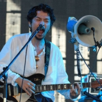 King Gnu plays the Red Marquee stage at Fuji Rock Festival in 2018. The four-piece made its debut on the Rookie A Go-Go stage a year prior, and this year will headline the event’s main Green Stage, making it the first band at Fuji to go from Rookie A Go-Go to headliner. | JAMES HADFIELD