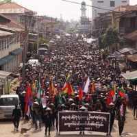 Protesters hold a demonstration against the military coup on Global Myanmar Spring Revolution Day in Kyaukme, Shan state, Myanmar, on Sunday. | SHWE PHEE MYAY NEWS AGENCY / VIA AFP-JIJI