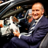 Herbert Diess, CEO of German carmaker Volkswagen AG, poses in an ID.3 prototype on the eve of the International Frankfurt Motor Show in 2019.  | REUTERS 