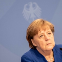 German Chancellor Angela Merkel attends the Petersberg Climate Dialogue in Berlin on Thursday.  | POOL / VIA AFP-JIJI