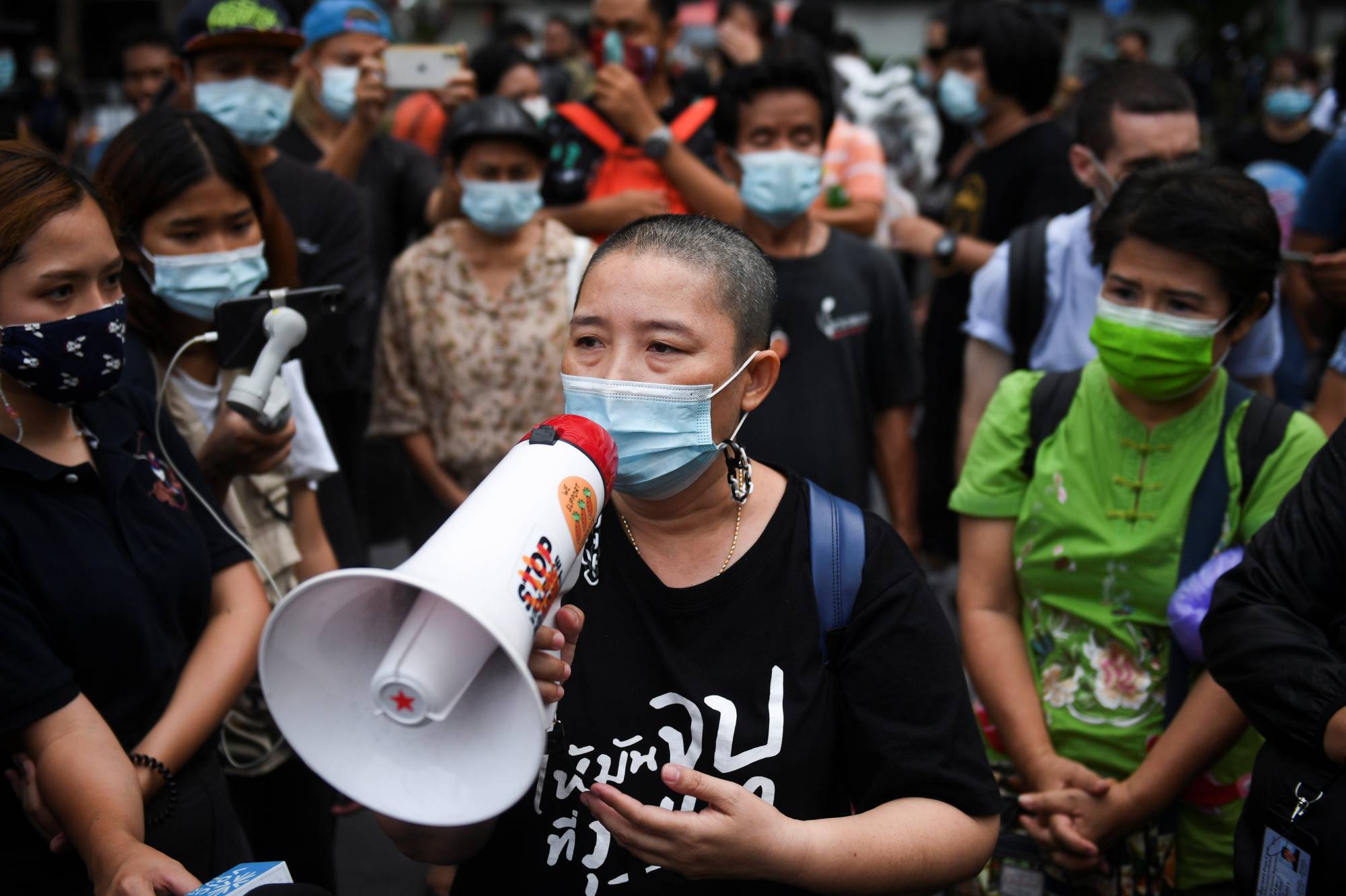 Sureerat Chiwarak attends a demonstration outside the criminal court in Bangkok on April 30. | Reuters 
