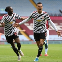 United\'s Mason Greenwood (right) celebrates after scoring against Aston Villa on Sunday. | AFP-JIJI