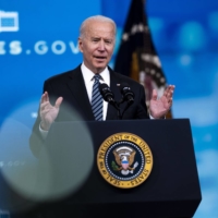 U.S. President Joe Biden speaks on the White House grounds in Washington on Wednesday.  | DOUG MILLS / THE NEW YORK TIMES