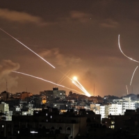 Rockets are launched from Gaza City toward Israel on Wednesday.  | AFP-JIJI