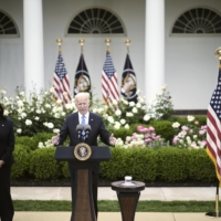 U.S. President Joe Biden, joined by Vice President Kamala Harris, speaks about update mask guidelines issued by the Centers for Disease Control and Prevention, at the White House on Thursday.  | T.J. KIRKPATRICK / THE NEW YORK TIMES