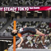Ryoichi Akamatsu competes in the men\'s high jump during an athletics test event for the 2020 Olympics at National Stadium on Sunday. | AFP-JIJI