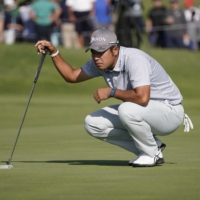 Hideki Matsuyama lines up a putt on the 18th green during the first round of the AT&T Byron Nelson in McKinney, Texas, on Thursday. | USA TODAY / VIA REUTERS