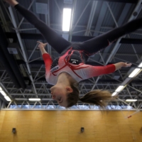 German gymnast Sarah Voss practices in a full bodysuit during a training session in Cologne, Germany, on Wednesday. | REUTERS