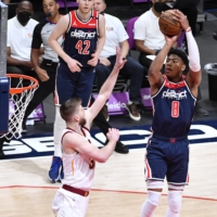Washington Wizards forward Rui Hachimura shoots over Cleveland Cavaliers forward Isaac Okoro during the first quarter of the Wizards\' 120-105 win over the Cavaliers on Friday.  | USA TODAY SPORTS / VIA REUTERS 