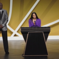 Vanessa Bryant, wife of the late Kobe Bryant, speaks on his behalf as NBA legend Michael Jordan looks on during the induction ceremony of the Basketball Hall of Fame\'s Class of 2020 on Saturday in Uncasville, Connecticut. | USA TODAY / VIA REUTERS