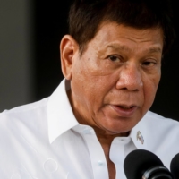 Philippines President Rodrigo Duterte speaks at Villamor Air Base in February.  | REUTERS