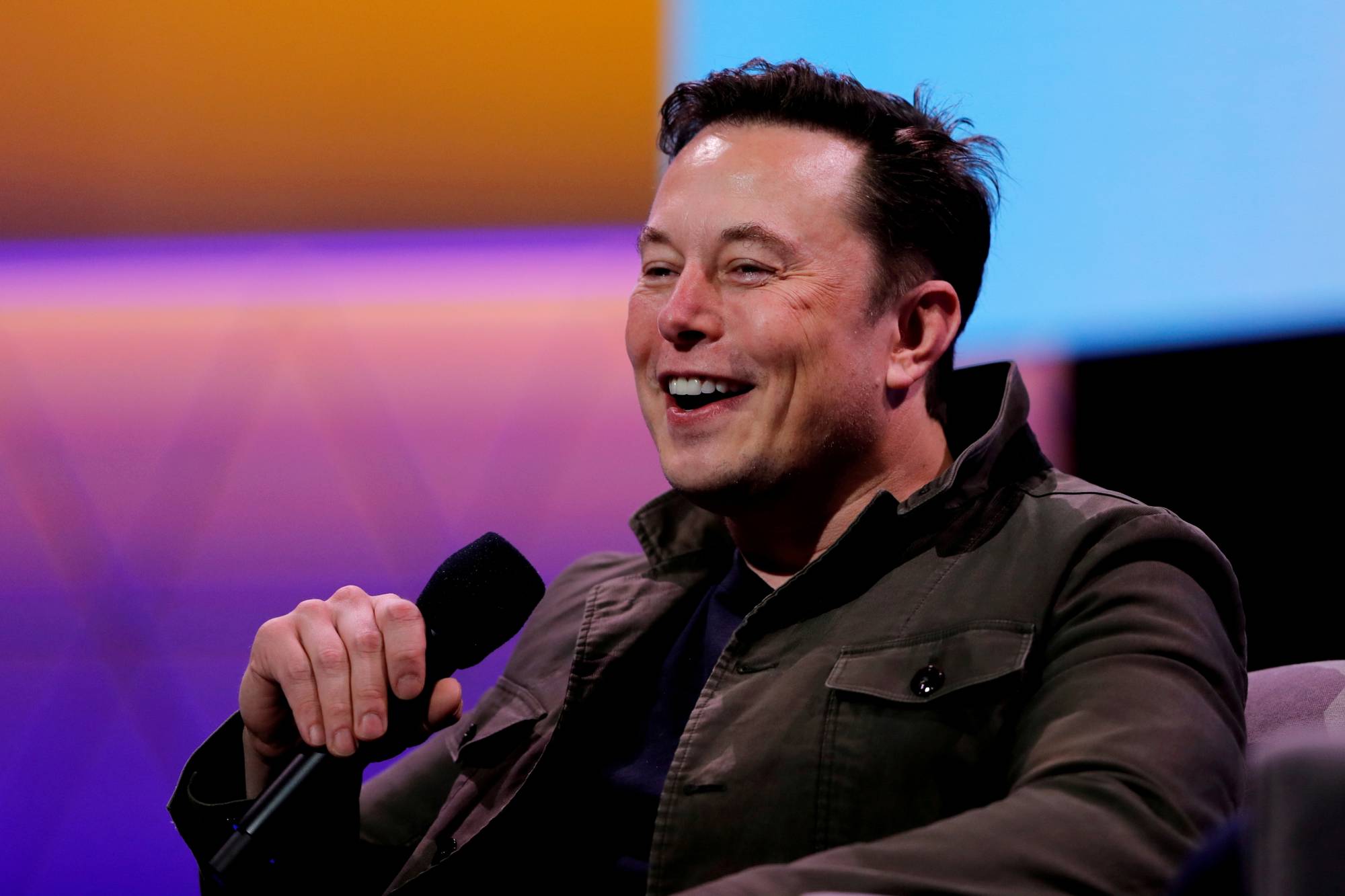 Tesla CEO Elon Musk speaks during the E3 gaming convention in Los Angeles in 2019. | REUTERS 
