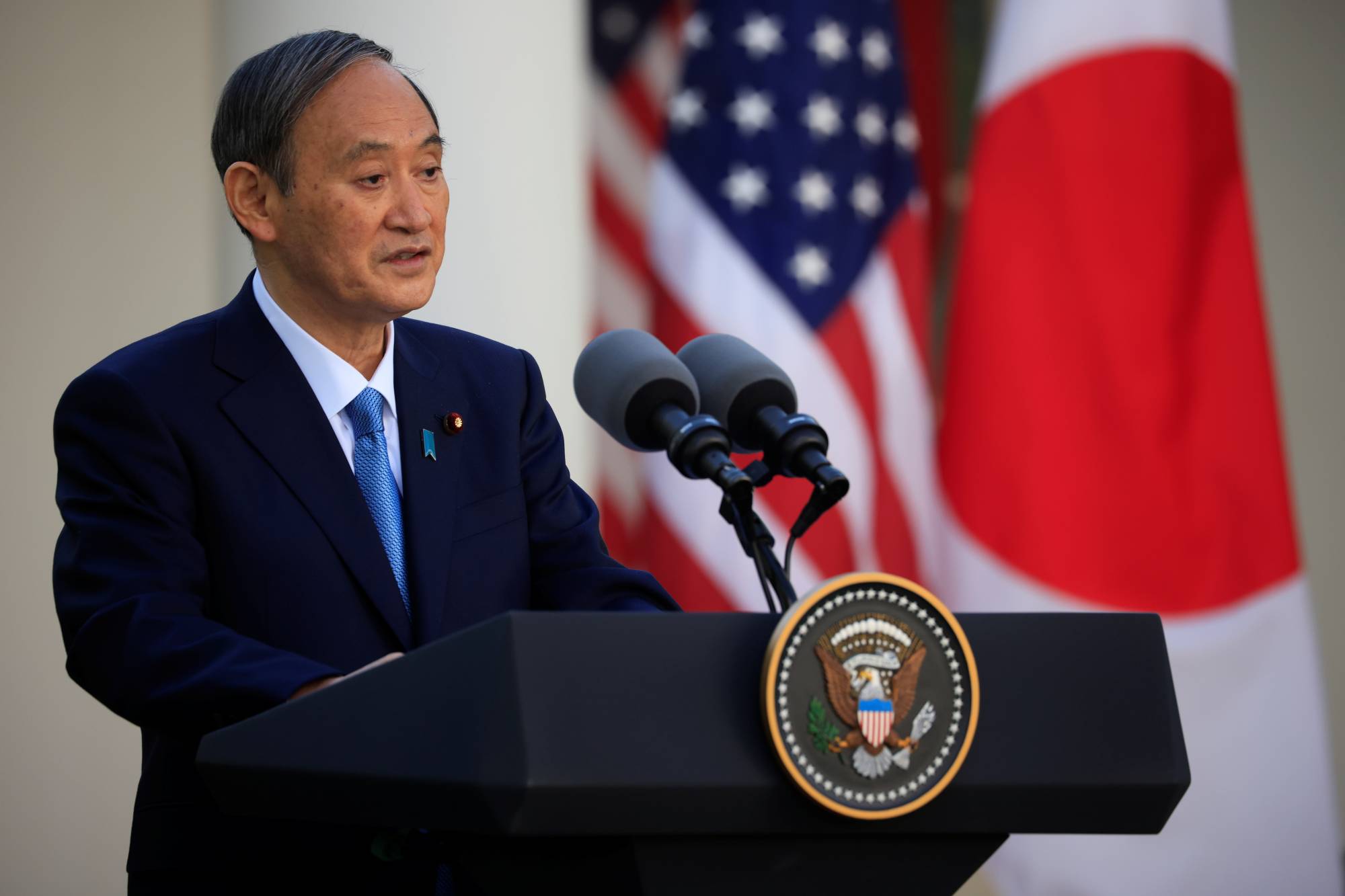 Prime Minister Yoshihide Suga held a joint news conference with U.S. President Joe Biden in April, during which the two reaffirmed cooperation on a number of issues. | REUTERS