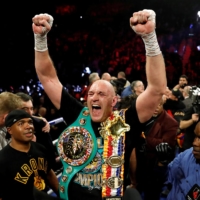 WBC heavyweight champion Tyson Fury will meet Anthony Joshua, holder of the IBF, WBO, WBA and IBO titles in a unification bout in August. | KYODO